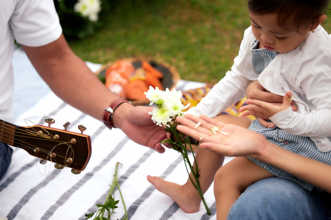 Family Visiting Loved One at a Memorial Park